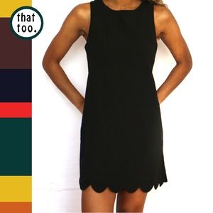 Black shift dress with scalloped hem